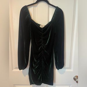 Emerald green velvet party dress